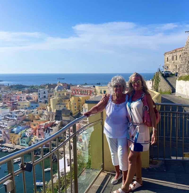 Me and my mum admiring the pretty island of Procida, Italy. This will be an optional excursion during our yoga retreat week
